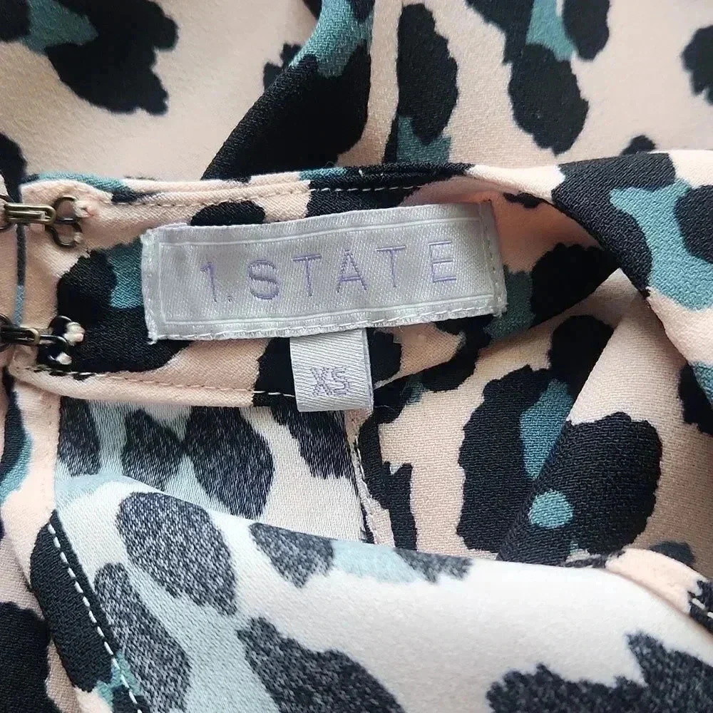 1. State Animal Print High Neck Swing Tank - Picture 3 of 6